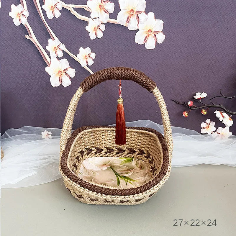 Coffee brown hand-woven straw basket with hemp rope accents measuring 19cm by 12cm