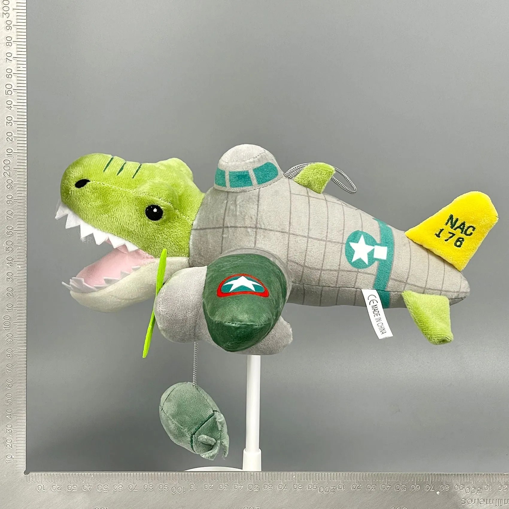 Shark game character plush toy collectible, such as cactus elephant or shark running shoes design, made from soft cotton wool.