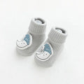 Baby socks with anti-slip glue dots on soles in combed cotton, showing mid-tube height and various colour options