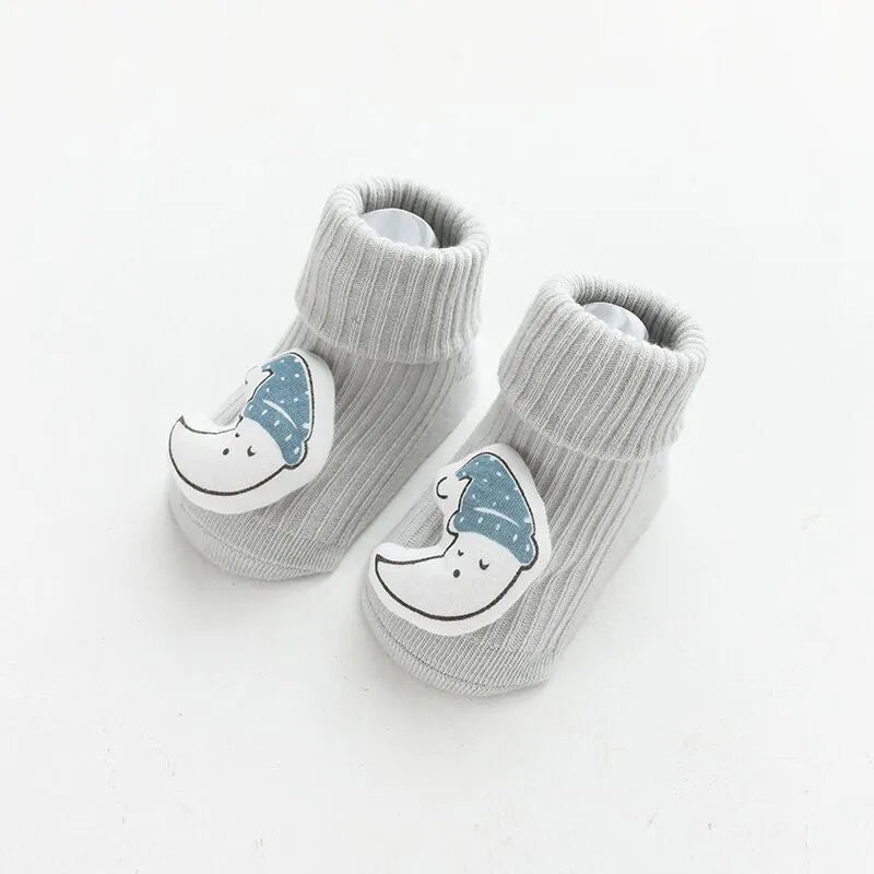 Baby socks with anti-slip glue dots on soles in combed cotton, showing mid-tube height and various colour options