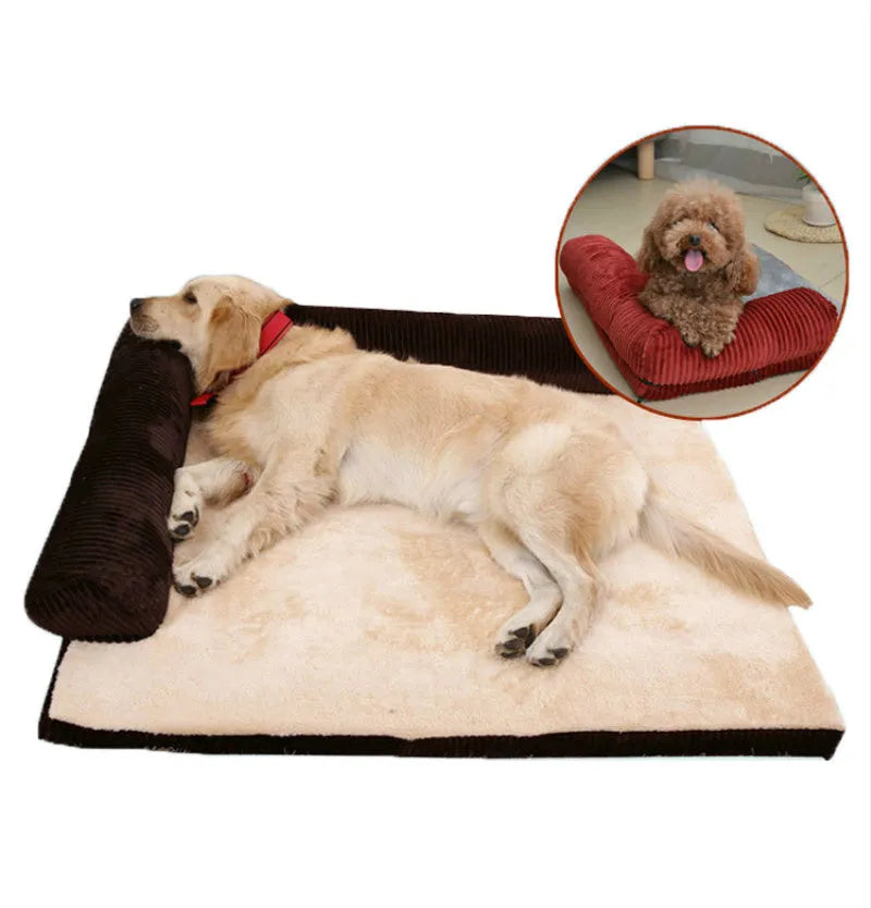 Grey corduroy pet sofa dog bed with bilateral bolsters and a non-slip cloth base on a wooden floor.