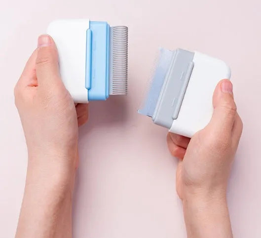Cat hair comb plastic grooming tool to remove floating fur available in multiple colours