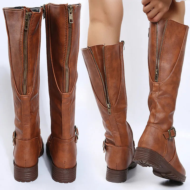 Women's black knight-style high boots with a round toe, buckle detail, and a square heel.