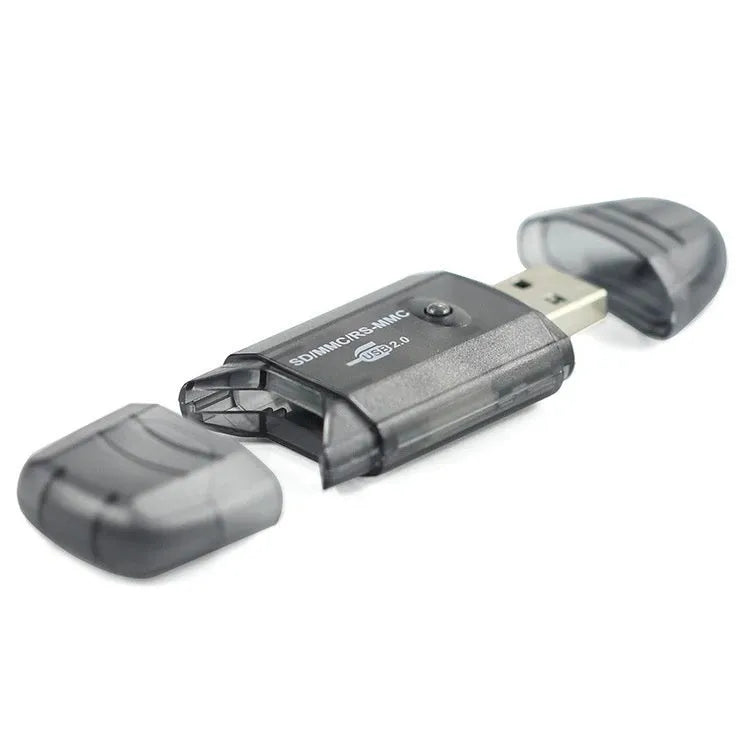 Transparent USB card reader with LED light and SD card slots on a desk.