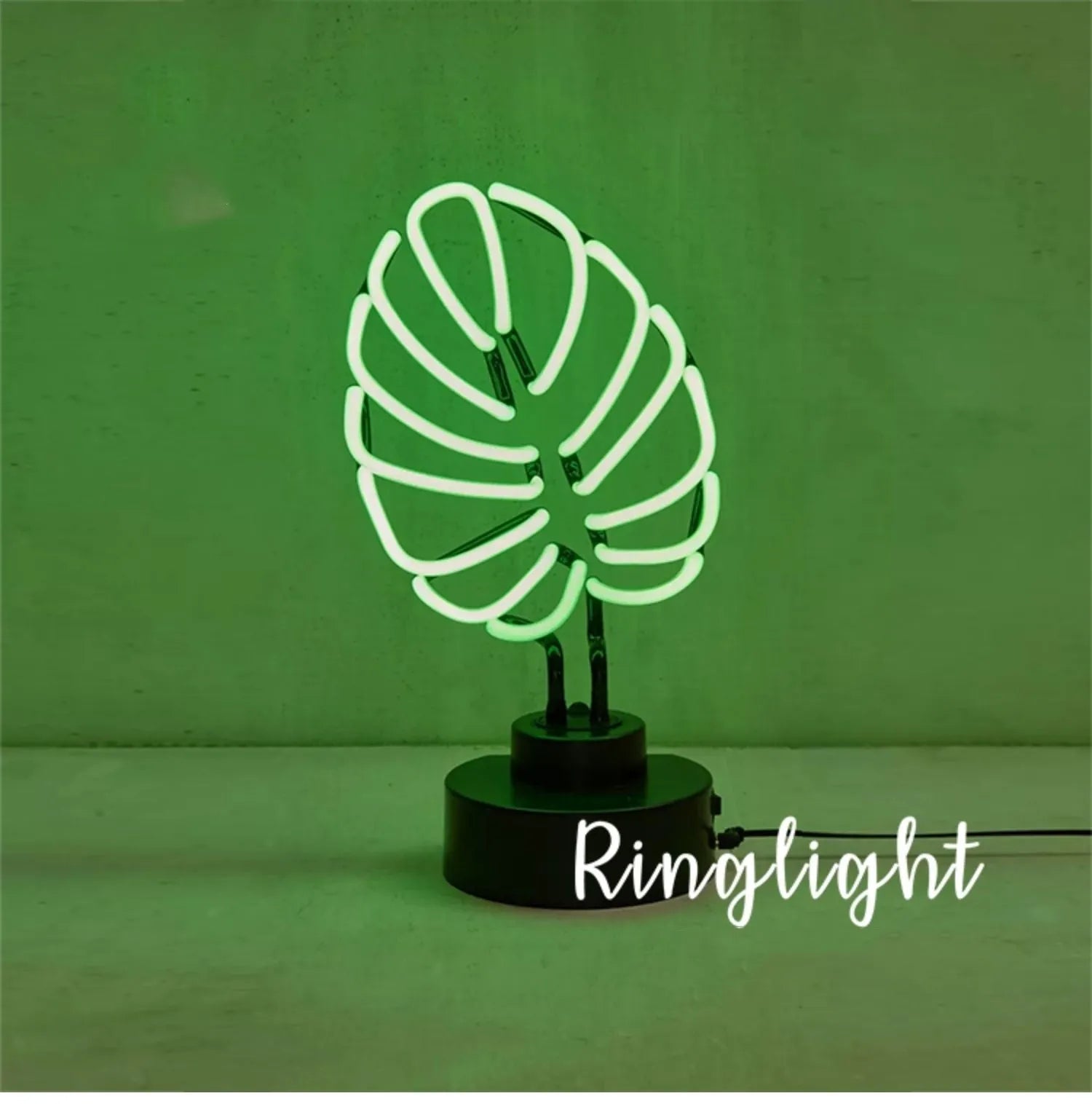 Handmade white bamboo-shaped desk lamp emitting green light, shown in two size options.
