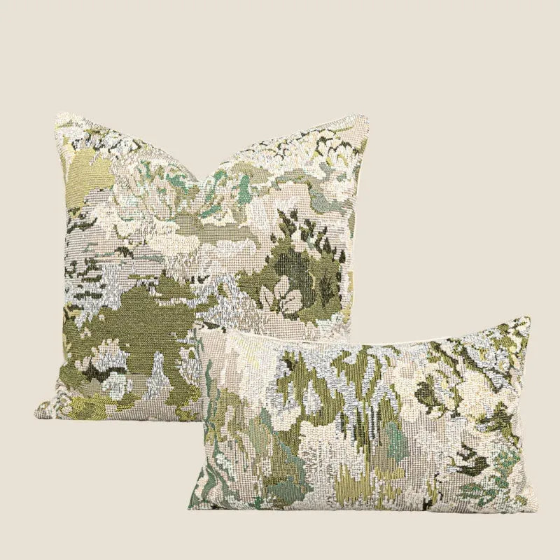 Antique green wool blend cushion with abstract spring flower botanical pattern.