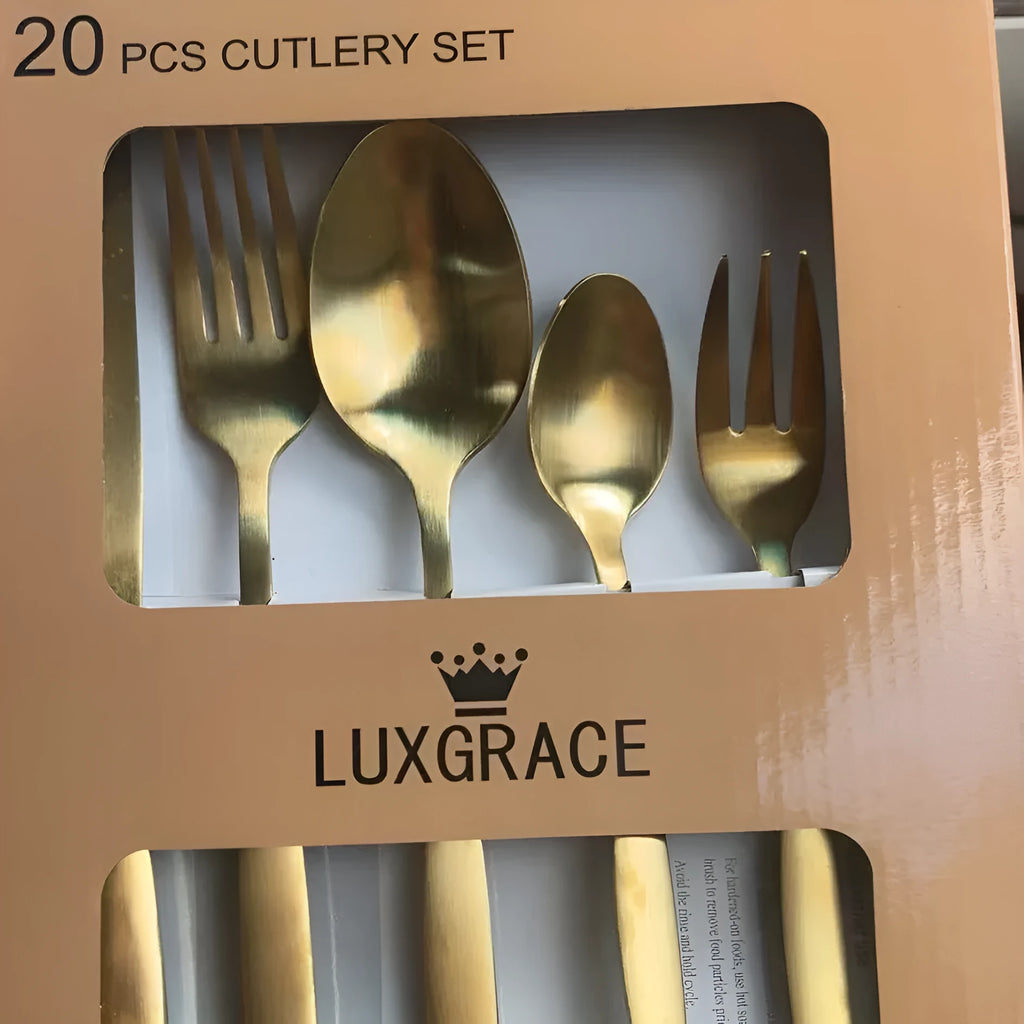 20-piece stainless steel cutlery set with mirror polished knives, forks and spoons on a table