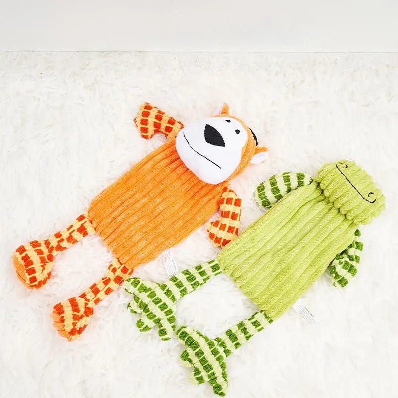 Green and orange 4-inch plush dog toy with squeaker for aggressive chewers