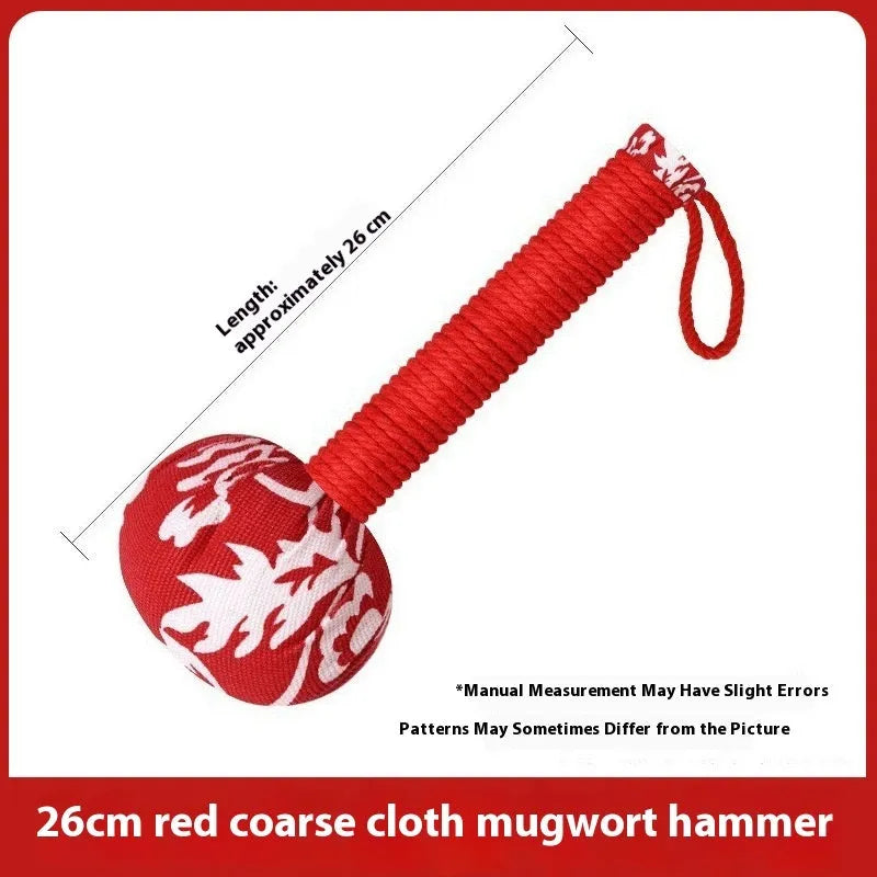 Argy wormwood handheld massage hammer in green colour on a plain background
