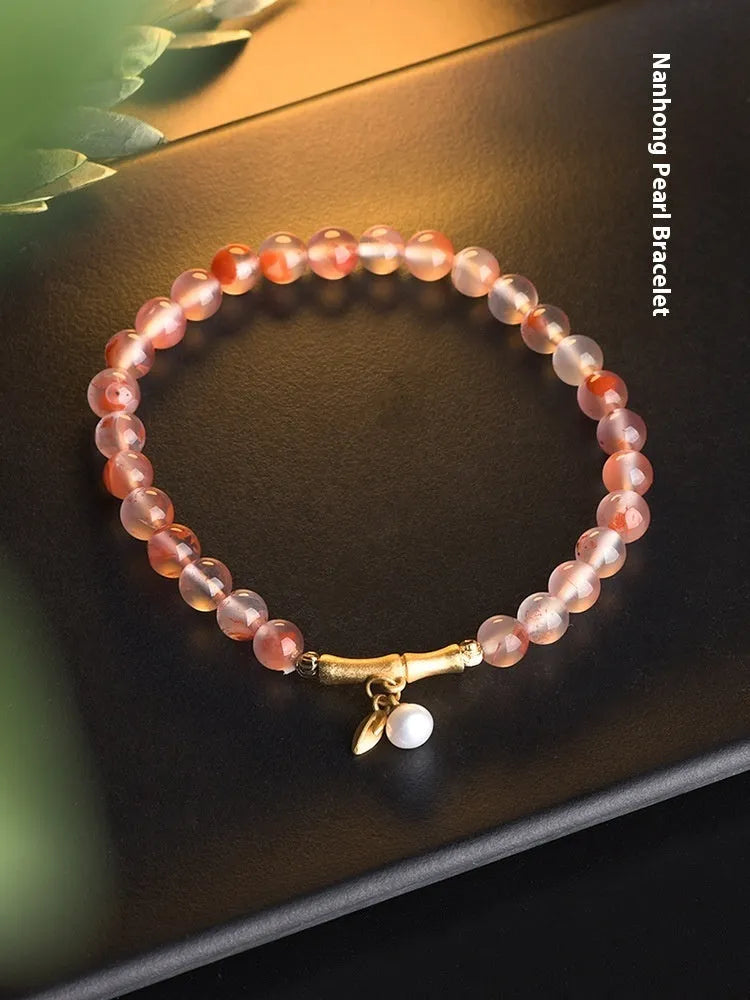 Ice float nanhong agate ethnic bracelet with flower shapes and bamboo joint decorative elements