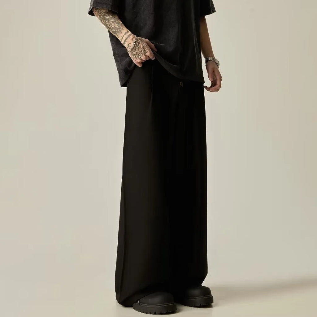 Men's vertical tube wide-leg trousers in solid black colour with micro-elastic waistband