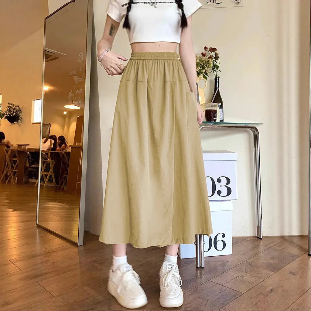 Camel coloured women's wide leg skirt with elastic waist and cropped length