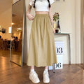 Camel coloured women's wide leg skirt with elastic waist and cropped length