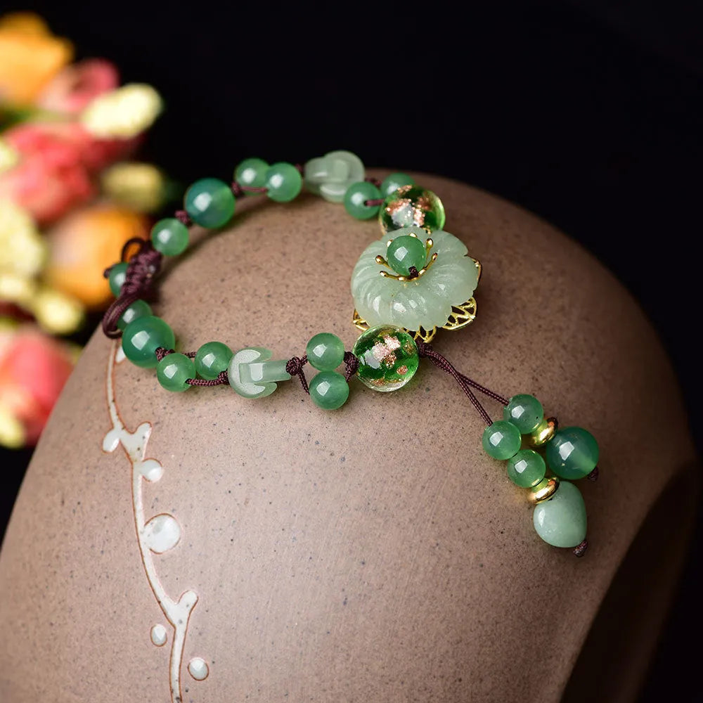 Hand-woven Chinese style bracelet with auspicious patterns and flower design in mixed materials