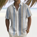 Man wearing a loose, printed polyester cardigan-style shirt in a casual setting.