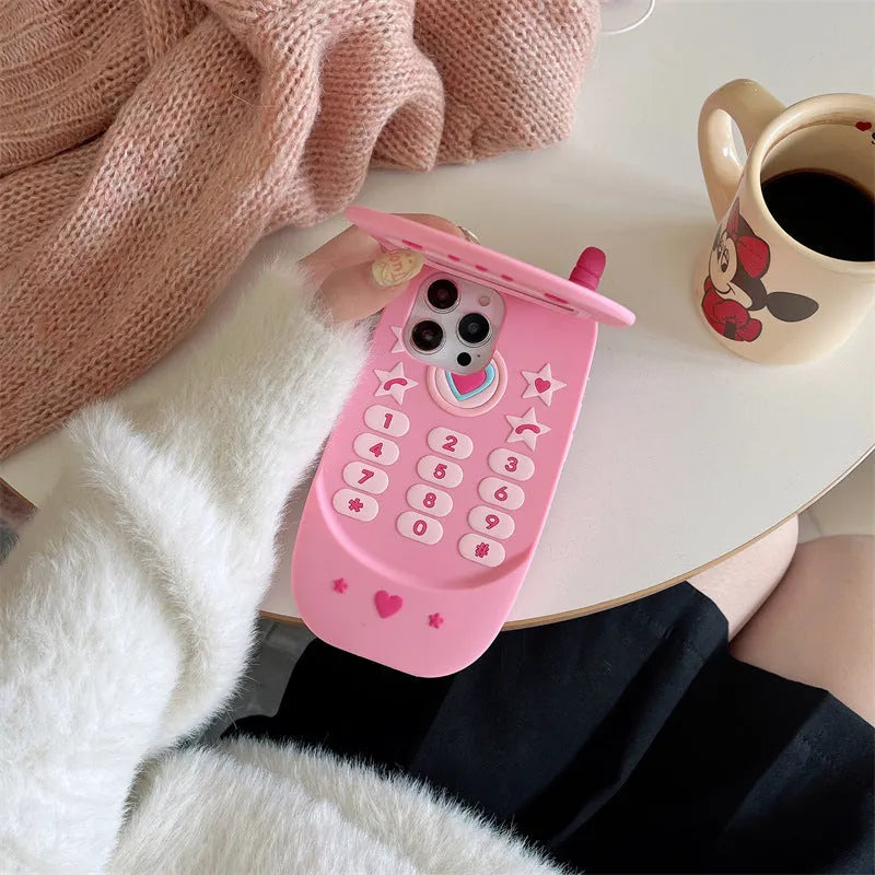 Light pink silicone flip phone case with a built-in mirror, shown next to a rose red version.