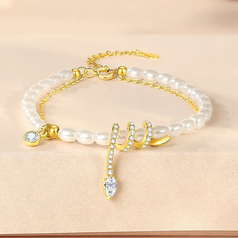 Pearl snake beaded bracelet in 925 silver with geometric snake charm and electroplated finish