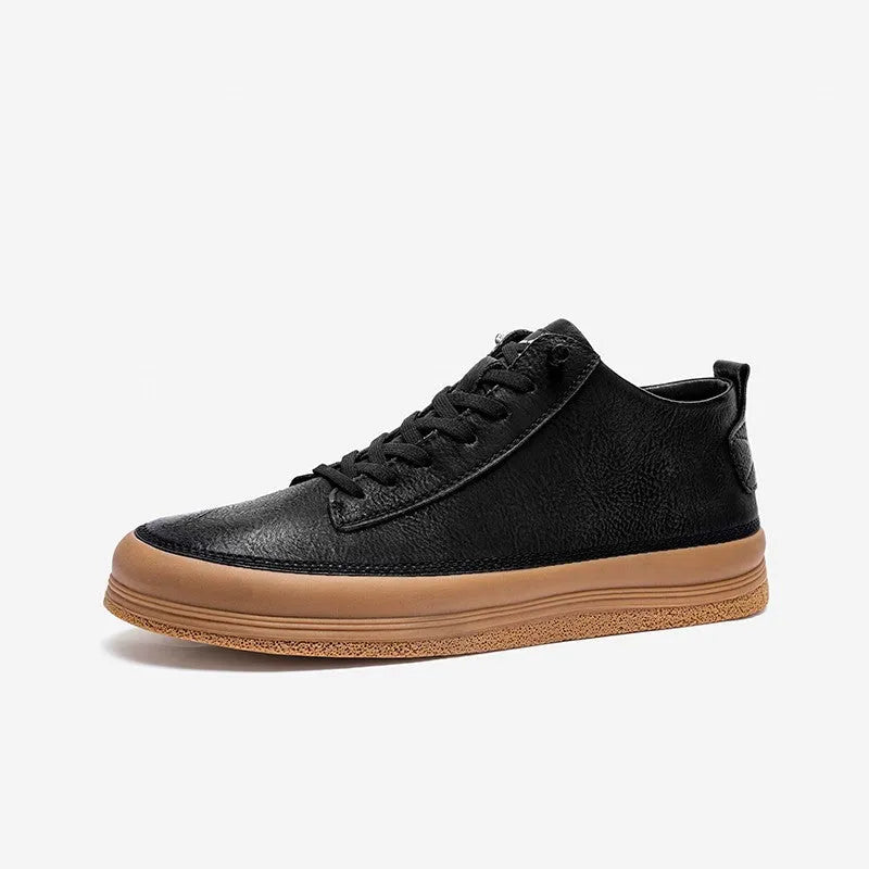 Men's black leather casual shoes with round toe and flat rubber sole on a white background.