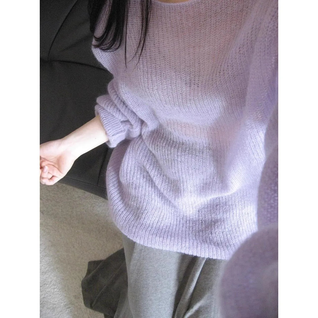 Purple ice silk women's blouse with hollow-out design and princess sleeves on a hanger.