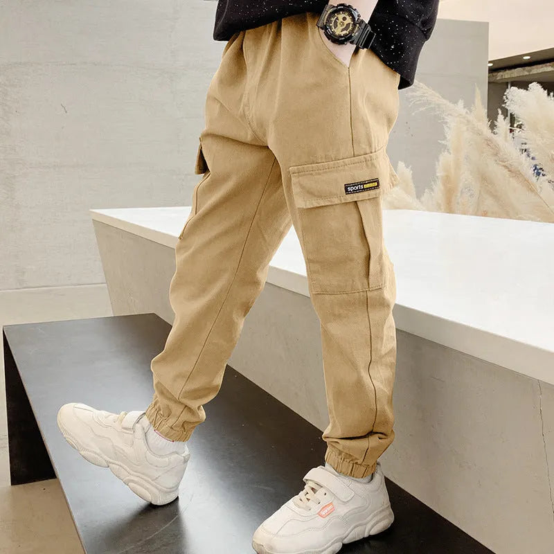 Boys' casual cotton summer trousers in khaki, shown in size for child over 140cm.