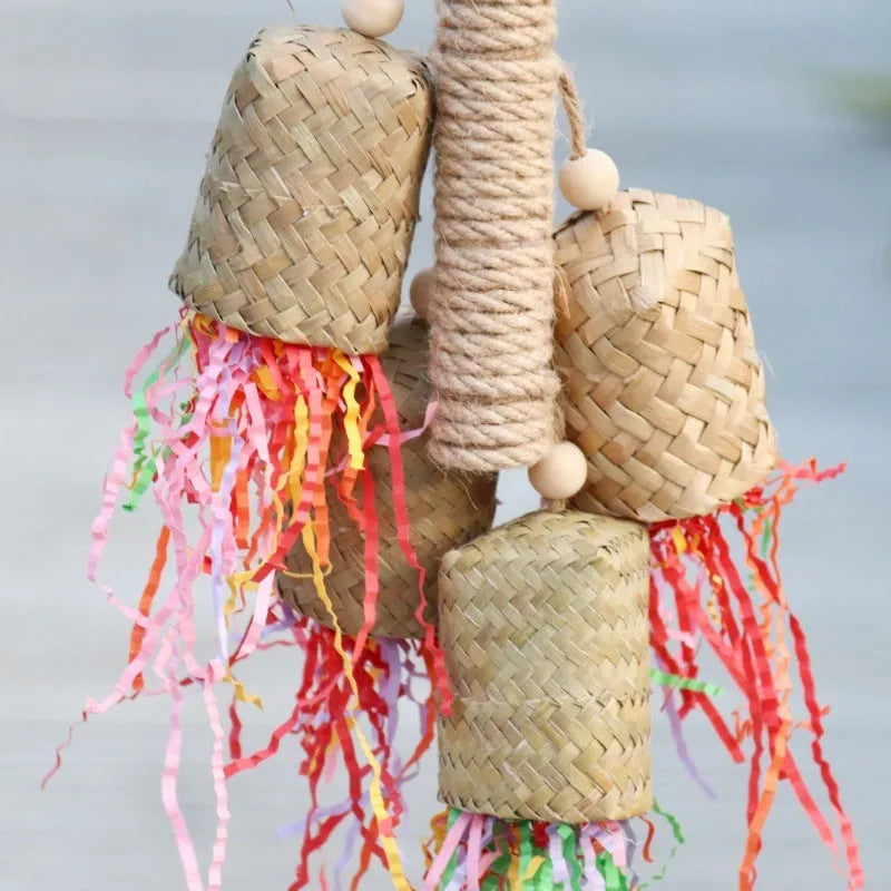 Colourful wood and sisal rope parrot foraging toy measuring 15cm by 35cm