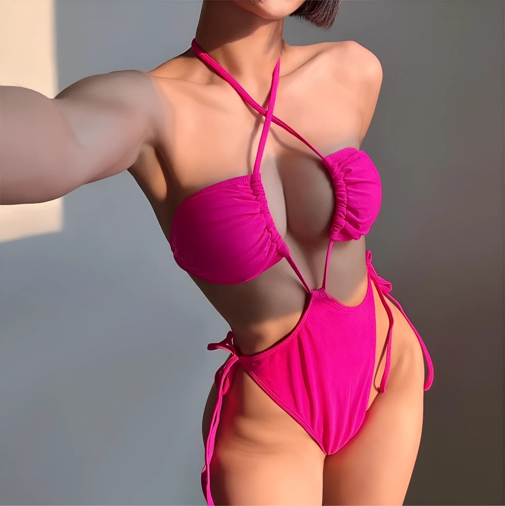 Women's black one-piece swimsuit with a front drawstring detail on a mannequin.