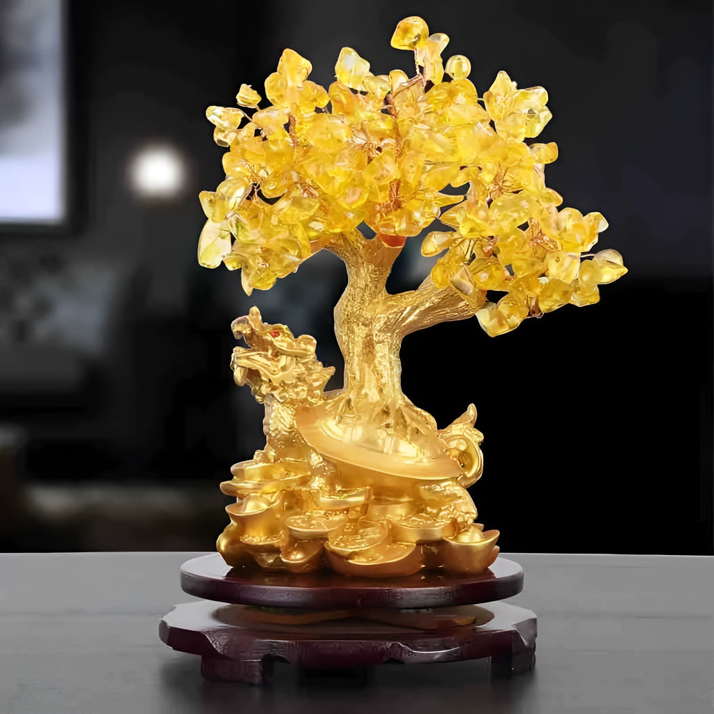 Citrine coloured resin turtle money tree Chinese style ornament on display.