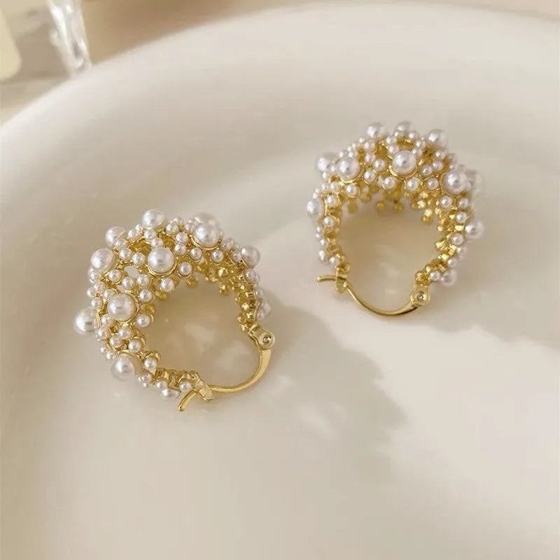 Gold colour women's flower basket earrings with copper construction and rice-shaped bead inlay