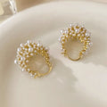 Gold colour women's flower basket earrings with copper construction and rice-shaped bead inlay