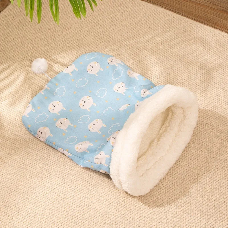 Flannel cat sleeping bag nest in pink, blue, and striped patterns, measuring 50x40 cm.
