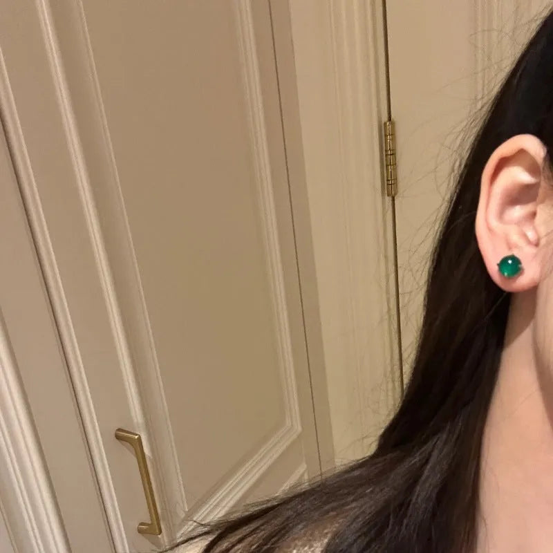 Round egg surface chalcedony stud earrings with Chinese retro design and four-claw copper setting