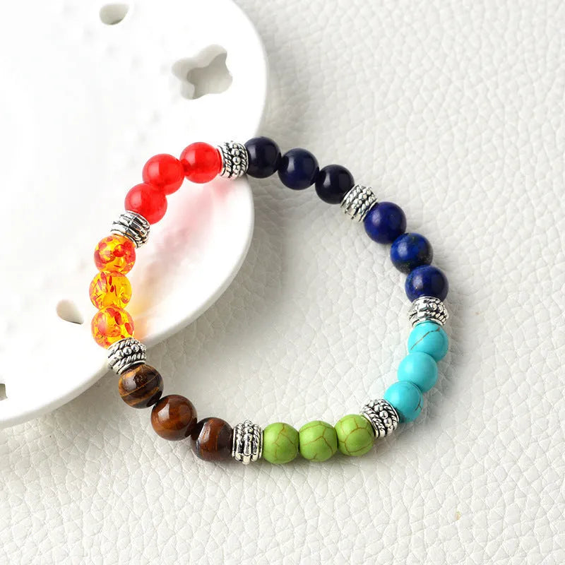 Natural stone colorful chakra energy yoga bracelet on wrist