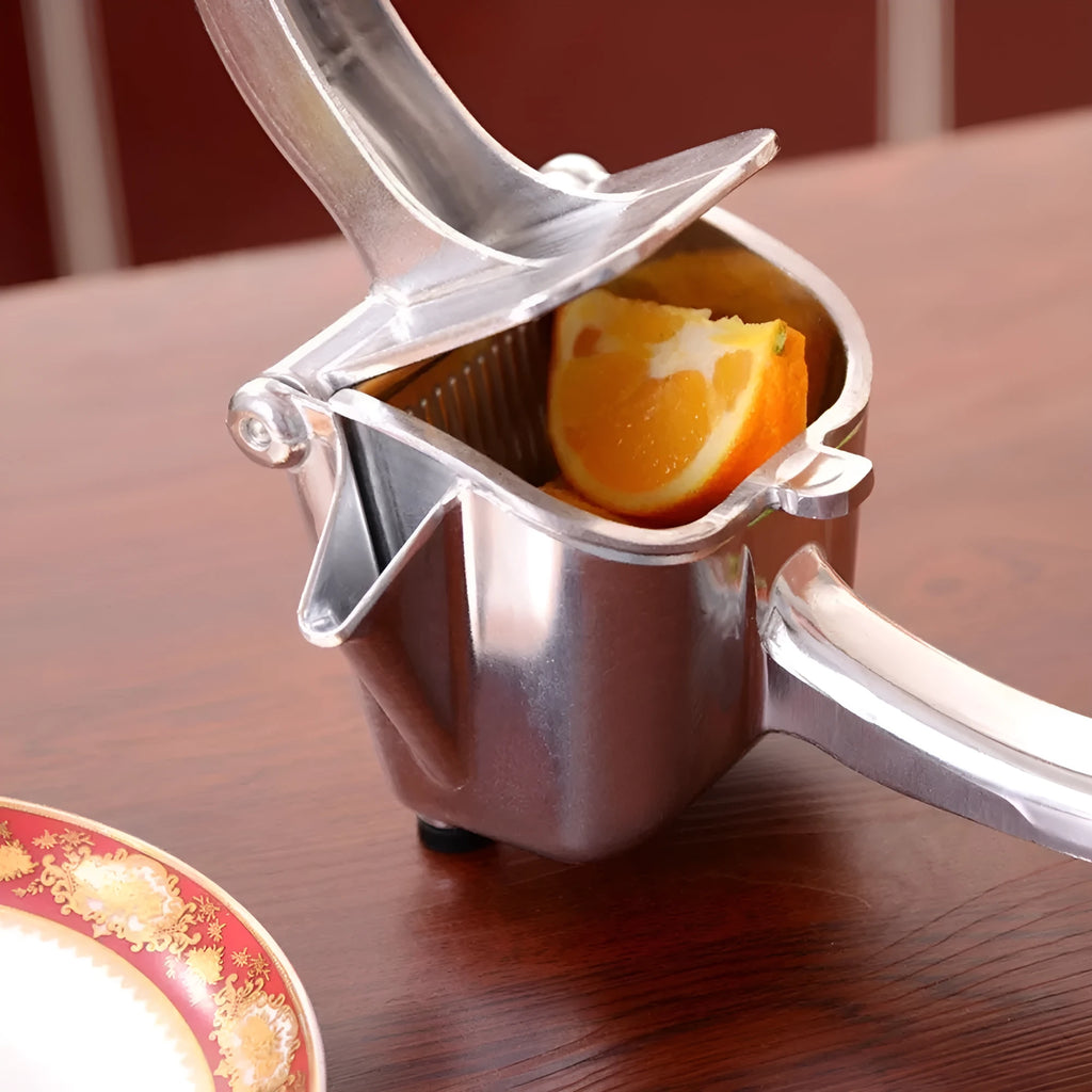 Silver heavy-duty aluminium and steel lemon squeezer press with large bowl.