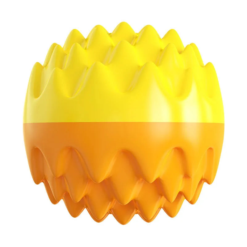 Blue and orange squeaky rubber dog ball with spiky texture for teeth cleaning and water fetch