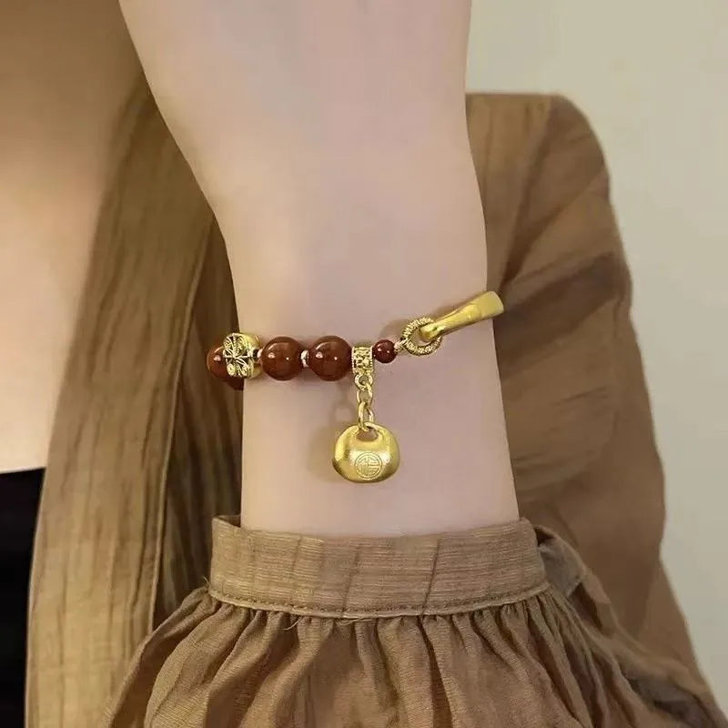 Golden South Red Agate character ingot half bracelet for women in antique style.