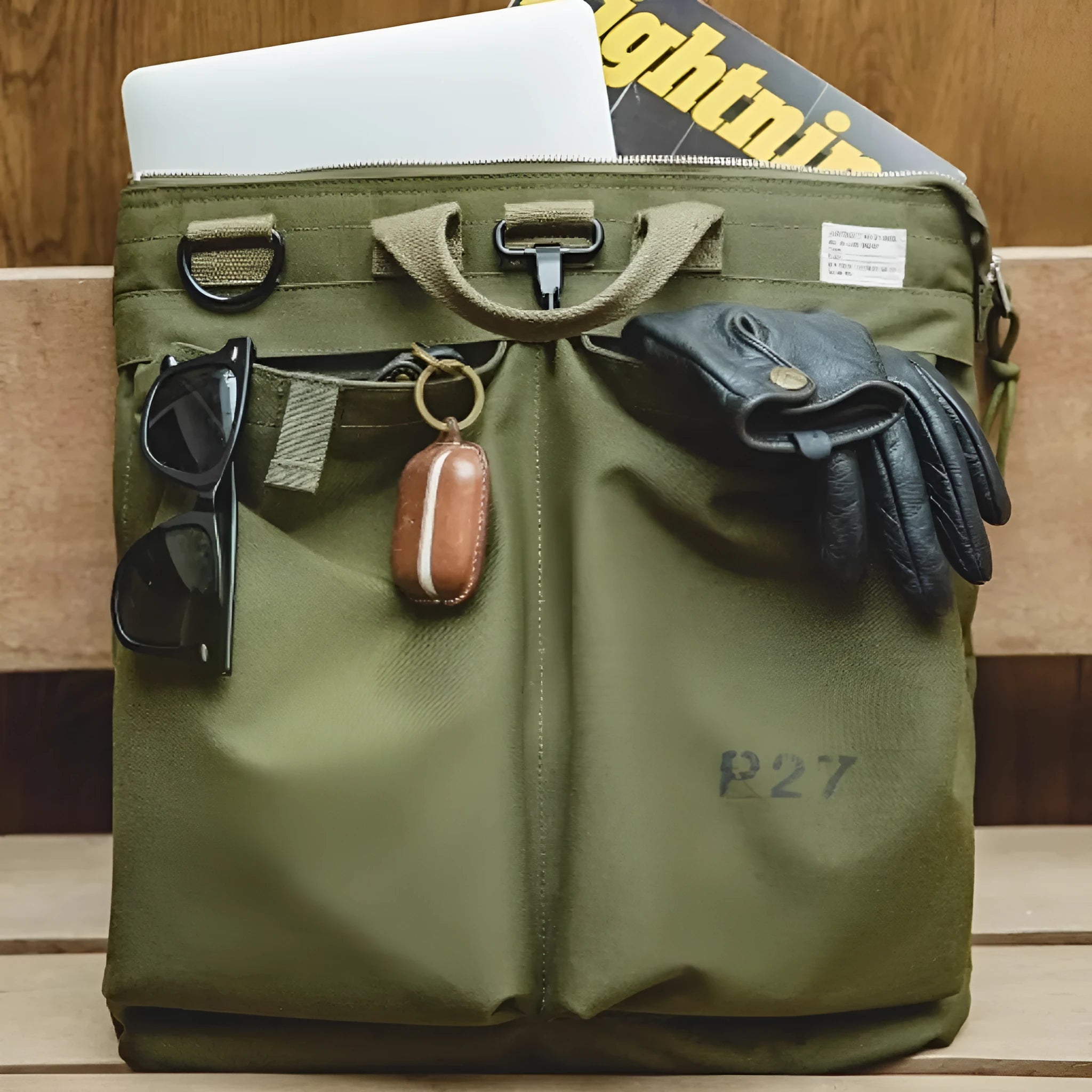 Marden Tooling canvas crossbody bag in military green with laptop compartment showing retro styling