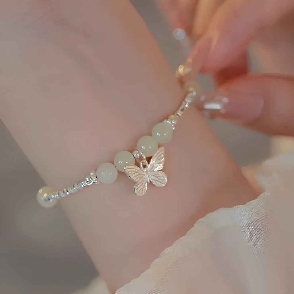 Women's Hetian jade bracelet and necklace set with silver butterfly charms on electroplated copper