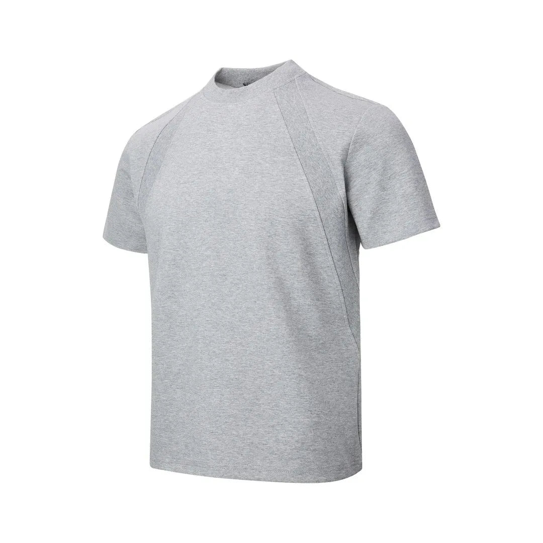 Loose fit short sleeve polyester top in black, shown on a model