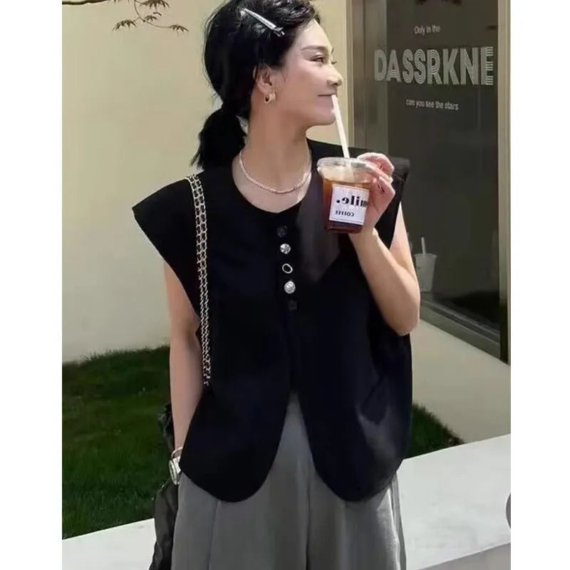 Women's loose-fit short polyester vest in milky white with a pocket, shown on a hanger.