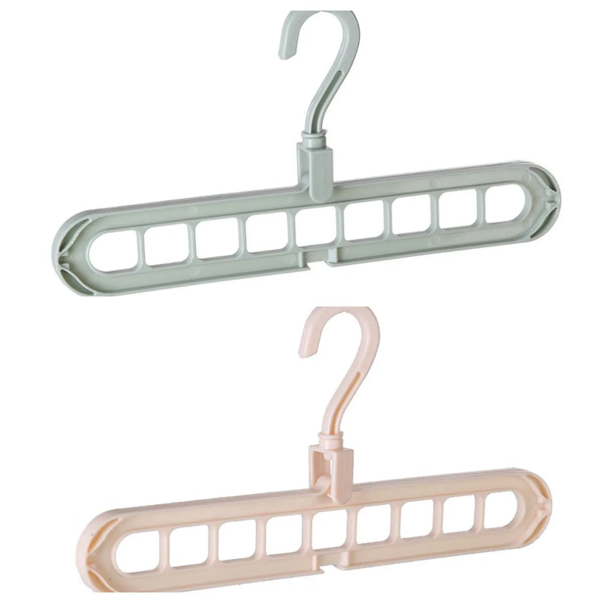 Pink plastic clothes hanger with a rotating hook on a white background.