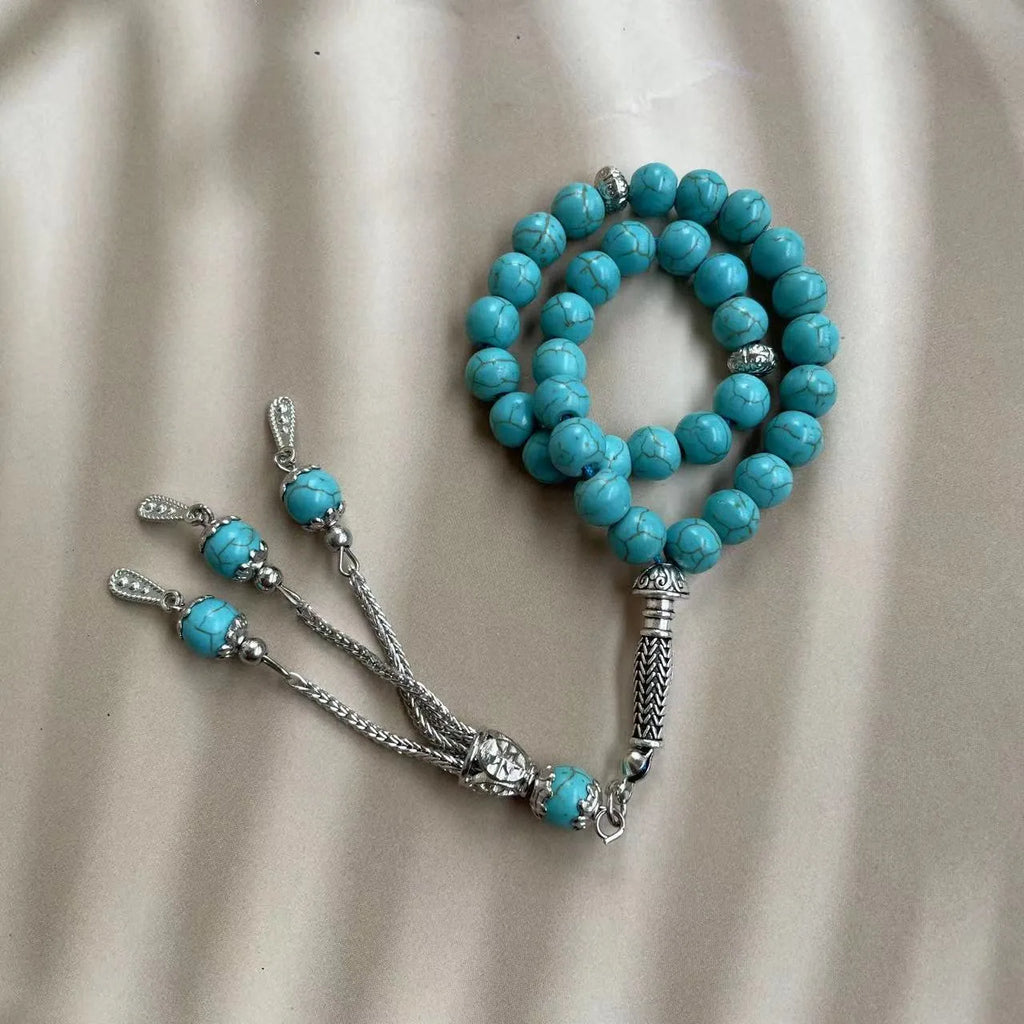 Handmade sky blue stone bead Muslim prayer bracelet for daily worship and dhikr counting.