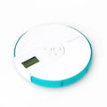 Blue 7-day pill organiser with digital alarm clock display and timer buttons