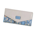 Women's large black tri-fold leather wallet with a buckle closure and a silver money clip inside.