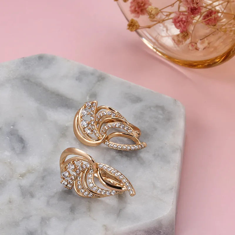 Wings design women's ear clips with micro inlaid zircon stones in gold-plated copper construction
