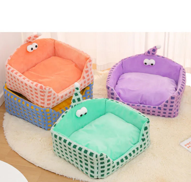 Green triangular cat bed with removable sponge pad, shown disassembled for washing.
