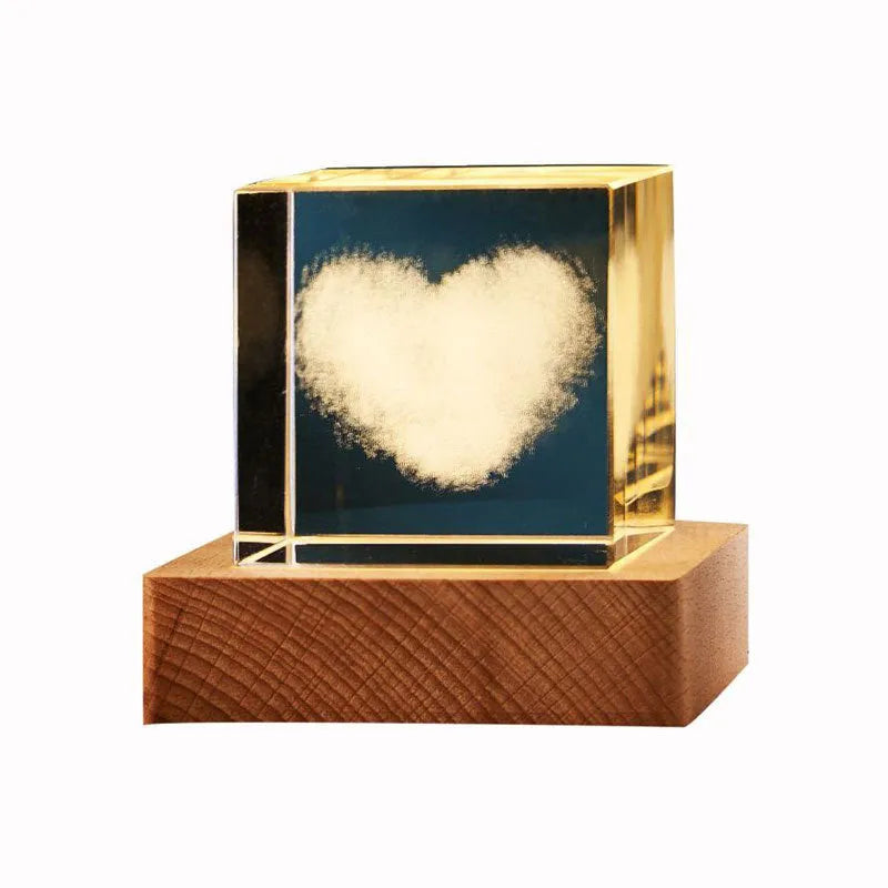 3D transparent crystal cube night lamp in 40mm or 60mm size on a desktop