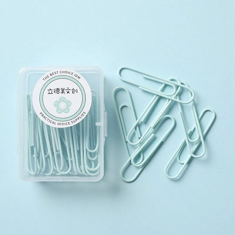 Set of macaron colour alloy paper clips in pink, green, and purple, showing 28mm and 50mm sizes, on a light background