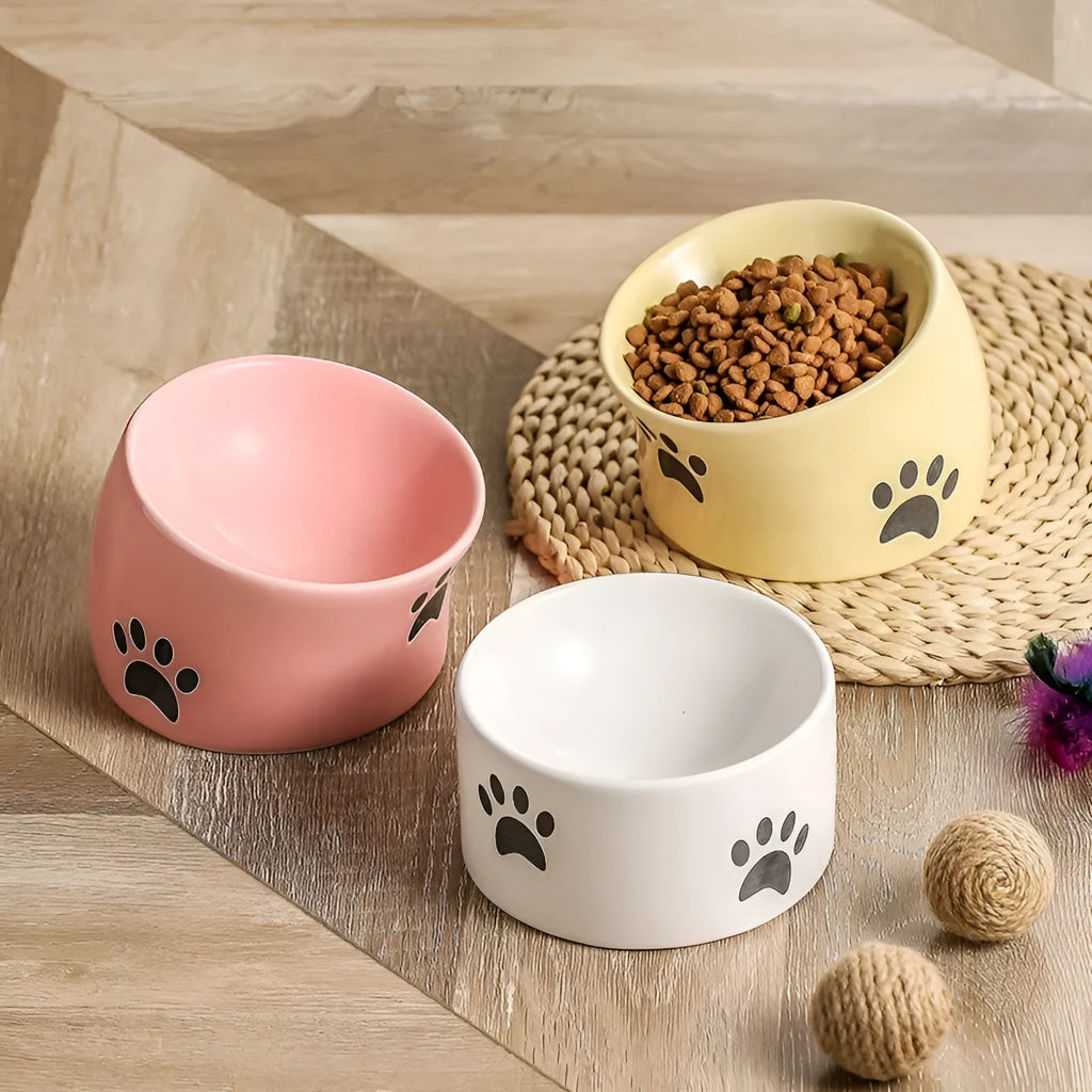 Ceramic cat bowl with high-footed design showing cat's paw decoration pattern in selected colour