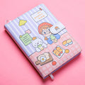 Small white Kaba Bear notebook with magnetic buckle closed, showing A6 size.