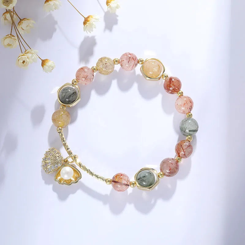Colourful crystal bracelet with hair crystal shell and red sealant flower shell designs